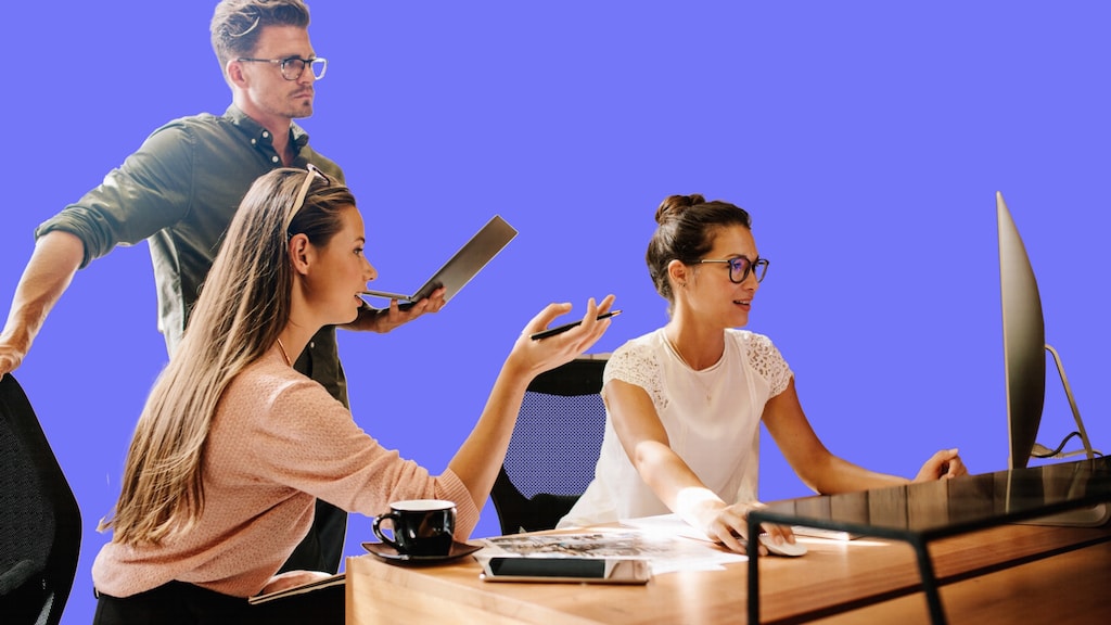 TasklyHub Free Task Management Software For Marketing Teams - Marketing Team At Desk